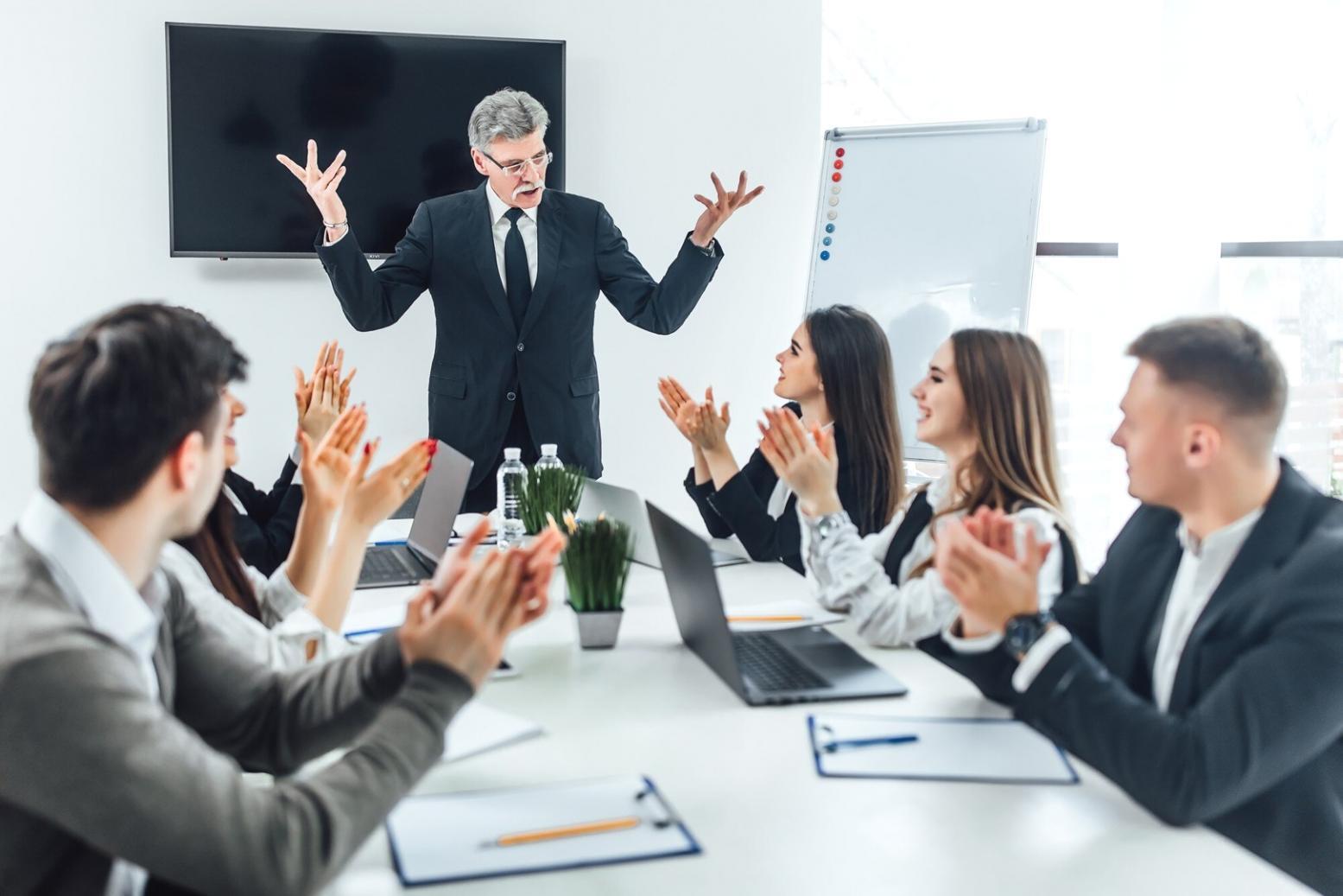 Financial planning documents and calculator on desk showing budget analysis